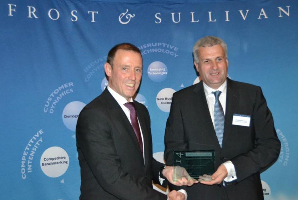 Christoph Conrad, head of Marketing SSP (right) accepts the award from Jörg Fey, Vice President, Business Development, Strategic Market Consulting at Frost & Sullivan