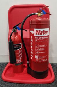 CO2 fire extinguisher and water-based fire extinguisher in an office